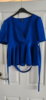 Koningsblauwe stretch peplum blouse met pofmouwen. Maat L, Maat 42/44 (L), Ophalen of Verzenden, Zo goed als nieuw