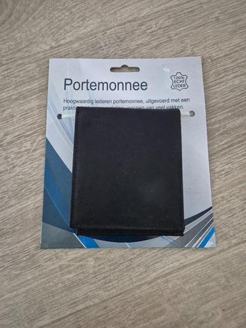 Te koop nieuwe zwartlederen heren portemonnee. beschikbaar voor biedingen