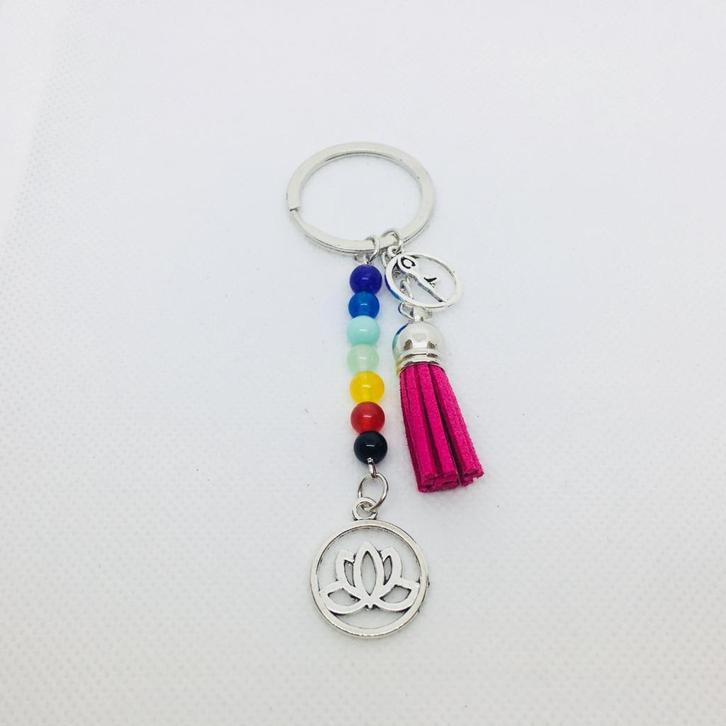 Chakra sleutelhanger met lotus en roze suède kwastje, Verzamelen, Sleutelhangers, Nieuw, Ophalen of Verzenden