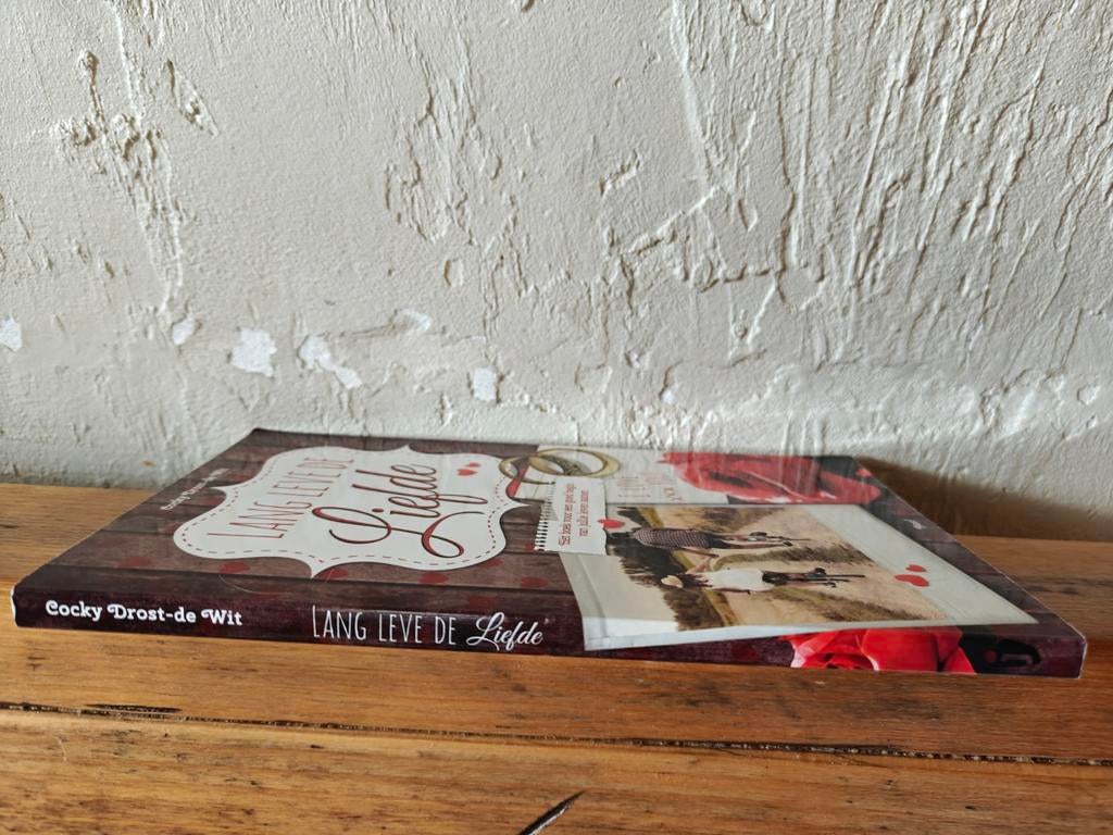 Lang leve de liefde., Ophalen of Verzenden, Zo goed als nieuw