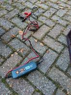 Acculader, Ophalen