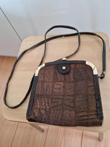 Kleine leren tas bruin vintage  beschikbaar voor biedingen