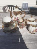 serviesset goud-wit-bloemen, Huis en Inrichting, Keuken | Servies, Ophalen, Gebruikt, Overige stijlen, Porselein