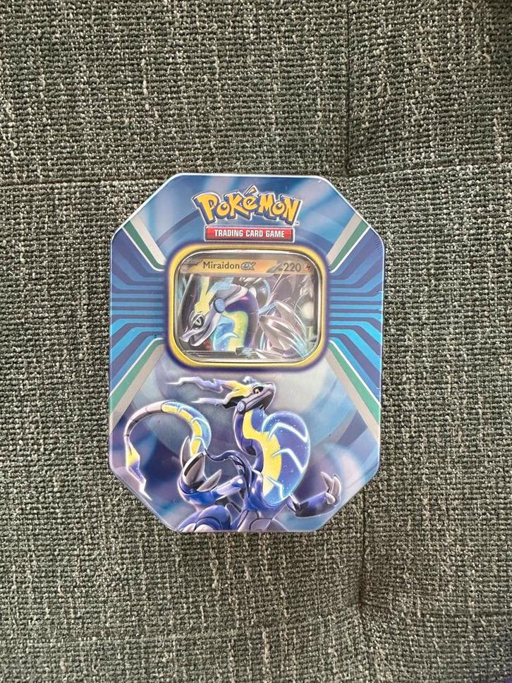 5x Pokemon Paldea Legends Tin Miraidon., Hobby en Vrije tijd, Verzamelkaartspellen | Pokémon, Nieuw, Ophalen of Verzenden