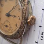 Oud mechanisch opwind klokje..waarschijnlijk oorlogjaar tijd, Ophalen of Verzenden, Staal, Overige merken, 1960 of later