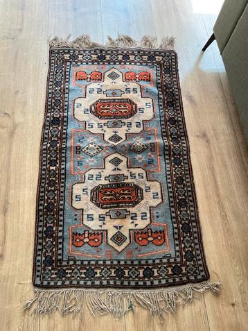 Vintage oosters Turks vloerkleed beschikbaar voor biedingen