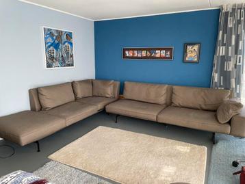 Comfortabele bruine hoekbank, zithoek beschikbaar voor biedingen