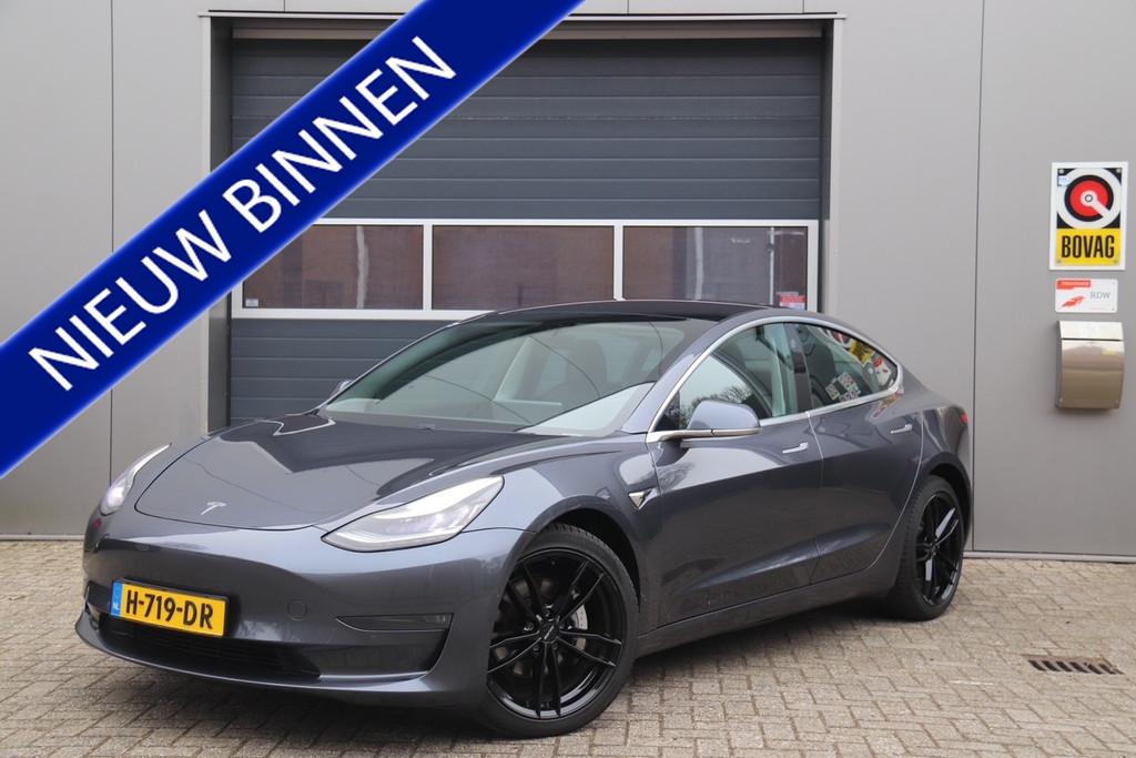 Tesla Model 3 Long Range AWD 75 kWh, Camera, Trekhaak, Pano, Auto's, Tesla, Automaat, Zwart, Stoelverwarming, Leder