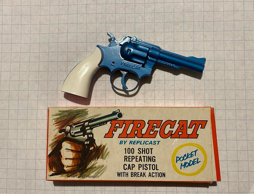 Vintage Firecat klappertjes pistool  met doosje jaren 70, Ophalen of Verzenden, Zo goed als nieuw