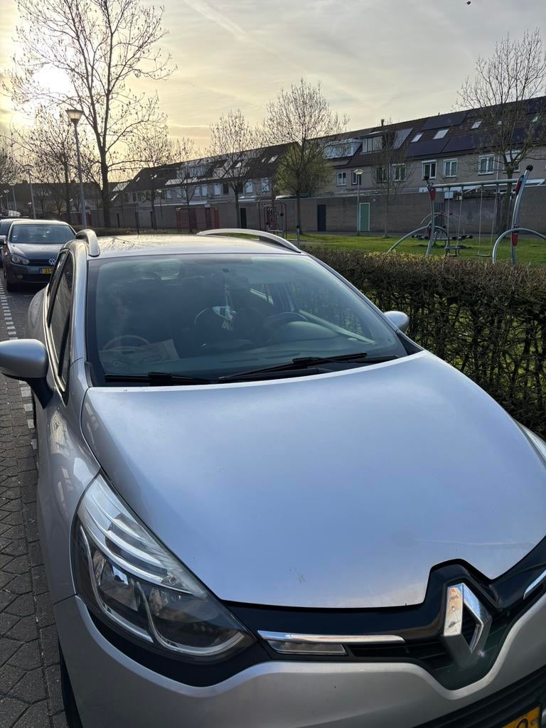 Renault Clio 1.5 DCI 66KW Estate 2014 Grijs, Auto's, Voorwielaandrijving, 4 cilinders, 1096 kg, Origineel Nederlands