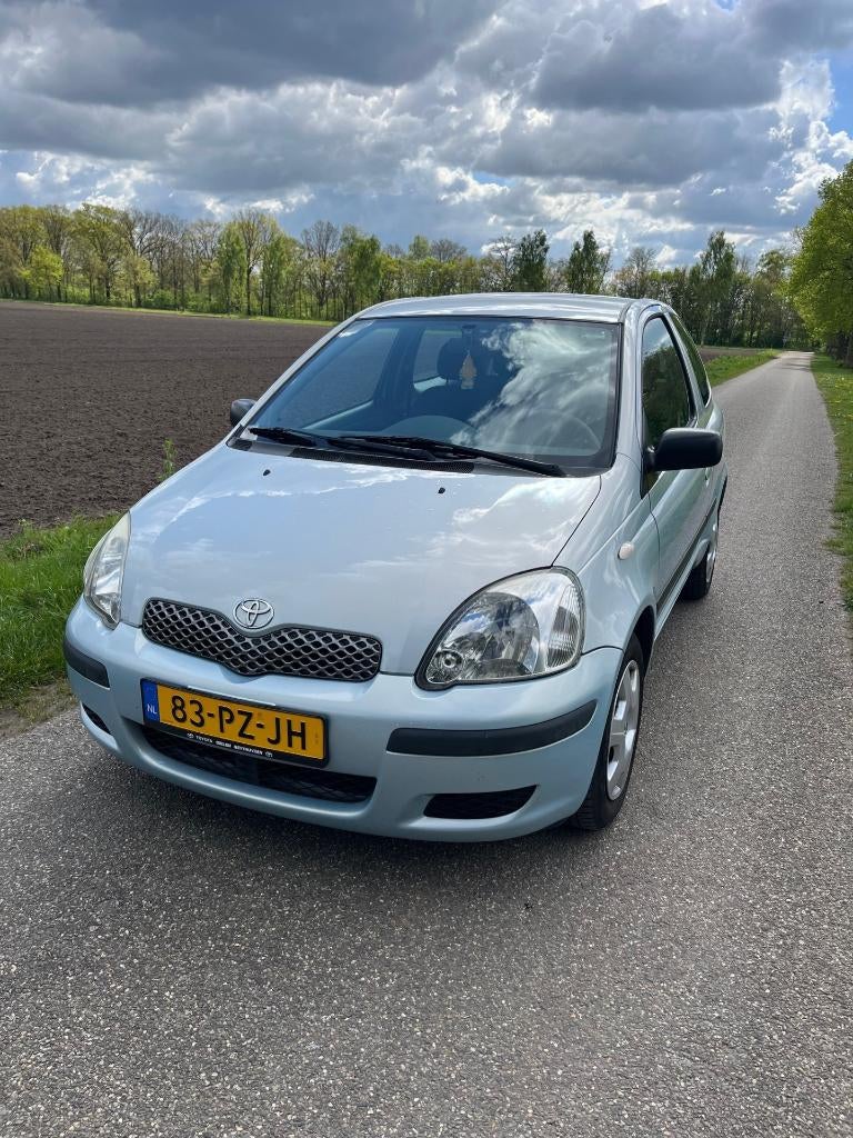 Toyota Yaris 1.3 16V Vvti 3DR Linea Terra 2005 Blauw, Auto's, Voorwielaandrijving, 31 €/maand, 4 cilinders, Origineel Nederlands