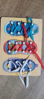 Plankje veters strikken, Ophalen of Verzenden, Zo goed als nieuw