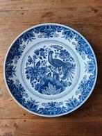 Delfts blauw bord, Ophalen