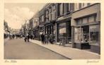 Den Helder - Spoorstraat Drukkerij Winkels en Fietsers, Verzamelen, Ansichtkaarten | Nederland, Ophalen of Verzenden, 1920 tot 1940
