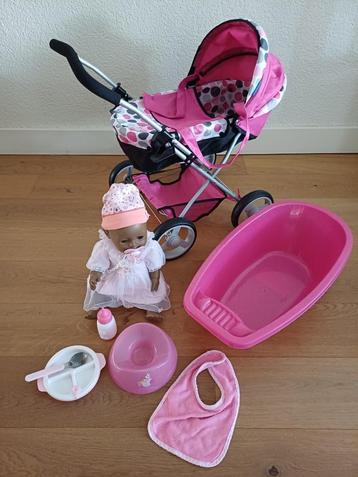 Poppenwagen, babyborn pop en uitgebreide verzorging set beschikbaar voor biedingen