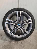 18' BMW 1 2 Serie Styling 556M met winterbanden Origineel, Auto-onderdelen, Banden en Velgen, Ophalen, 18 inch, Banden en Velgen