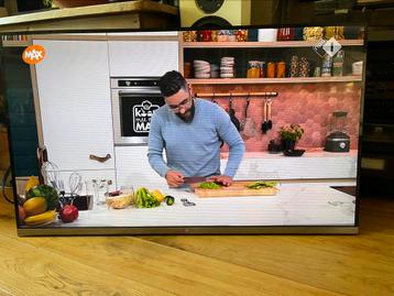 LG 55 Inch led tv,speelt maar met horizontale dunne lijntjes beschikbaar voor biedingen