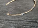 14 k gouden en witgouden balletjes armband 5 gram, Ophalen of Verzenden, Nieuw, Goud, Goud