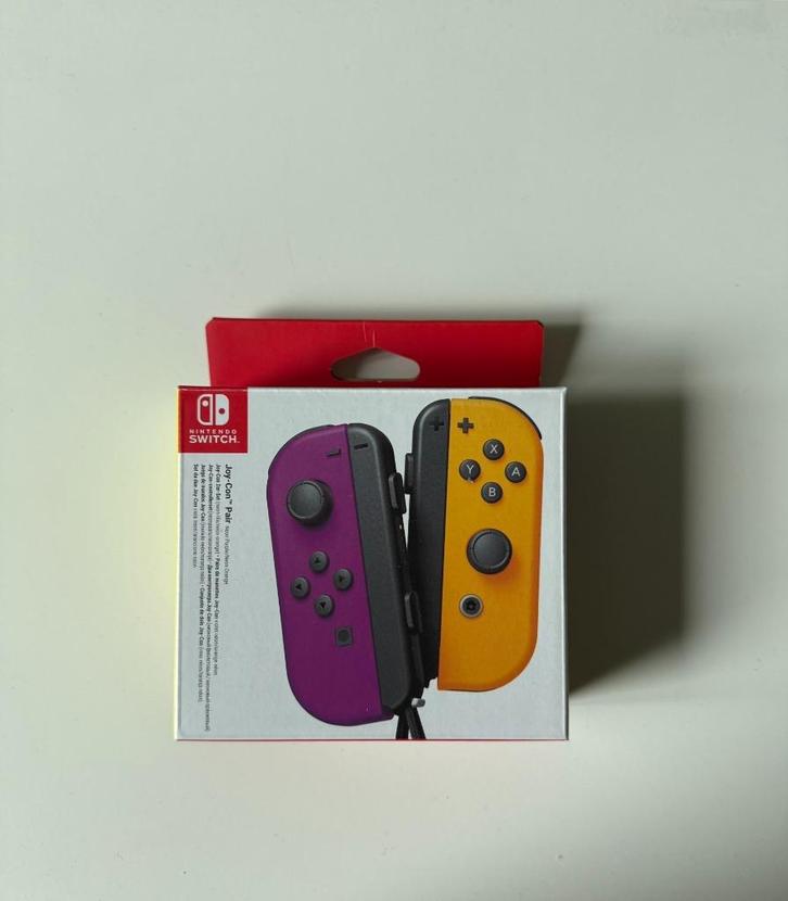 Nintendo Switch Joy-Con pair Neon paars/oranje, Spelcomputers en Games, Spelcomputers | Nintendo Switch, Zo goed als nieuw, Switch OLED