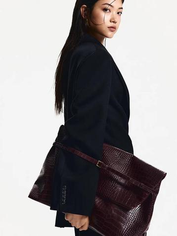 H&M oversized clutch beschikbaar voor biedingen