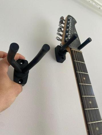 Muurbeugel gitaar beschikbaar voor biedingen