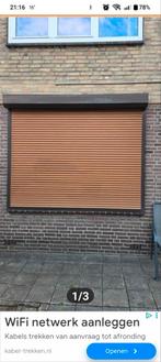 elektrische Rolluik, Ophalen, Zo goed als nieuw
