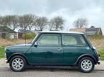 Rover Mini 1.3 Cooper Leder/Stof Audio/CD LMV 12" 89802 km's, Voorwielaandrijving, Metallic lak, 63 pk, Zwart