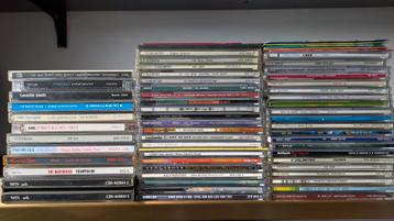 Diverse cd singles (45) & cd's (10) & DVD's (8) beschikbaar voor biedingen