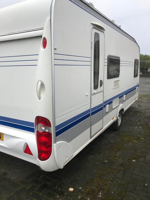 Nette hobby kmfe caravan met voortent, Caravans en Kamperen, Caravans, Bedrijf, meer dan 6, 1000 - 1250 kg, Treinzit, Hobby, Dwarsbed