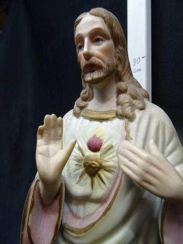 1147=Christus met het Heilig Hart, porselein.2710 beschikbaar voor biedingen