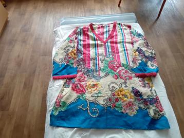 Strandjurk met 3/4 mouw en zijsplitjes. Zgan. beschikbaar voor biedingen
