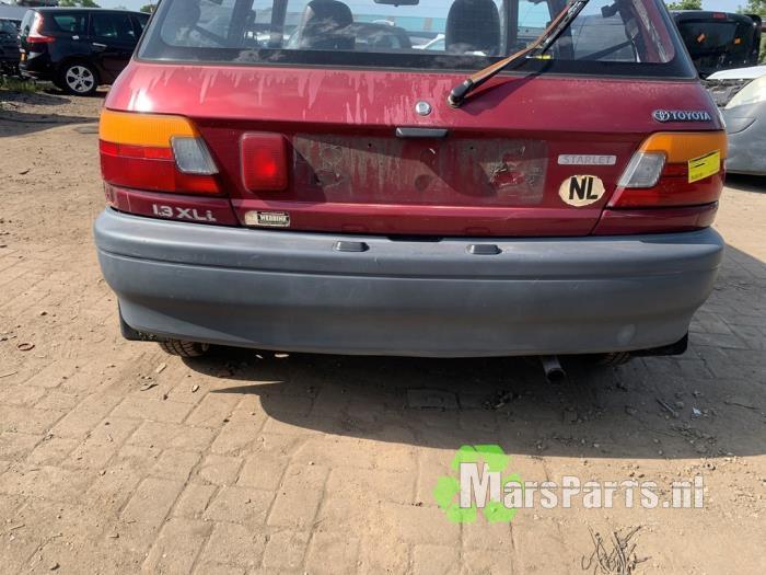 Achterbumper van een Toyota Starlet, Auto-onderdelen, Carrosserie en Plaatwerk, Bumper, Toyota, Gebruikt, 3 maanden garantie, Ophalen of Verzenden
