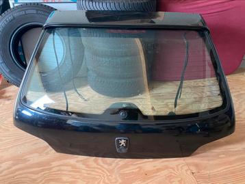 Zeer mooie zwarte achterklep Peugeot 106 met spoiler  beschikbaar voor biedingen