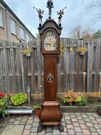 Staande Klok, Ophalen