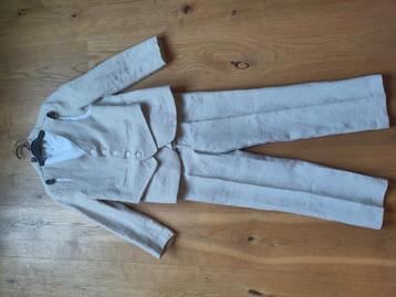 Beige Kinderpak maat 128 beschikbaar voor biedingen