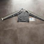 Adidas Latex Crop Top - Nieuw met prijskaartje, Kleding | Dames, Tops, Zwart, Maat 42/44 (L), Nieuw, Ophalen of Verzenden