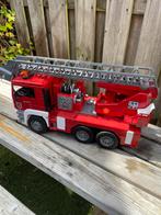 Bruder brandweerauto met sirene, licht en geluid, Ophalen of Verzenden, Gebruikt