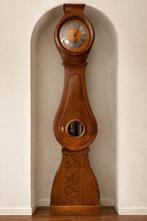 Klok Mora klok uit Zweden, Ophalen