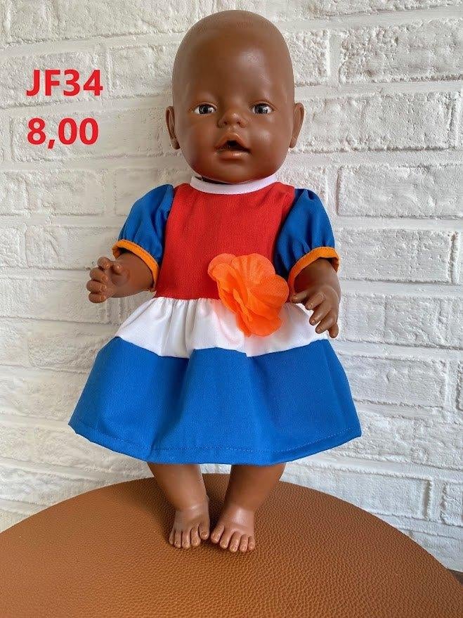 Poppenkleertjes baby born. Koningsdag. Opbrengst KiKa., Kinderen en Baby's, Speelgoed | Poppen, Ophalen, Nieuw, Babypop