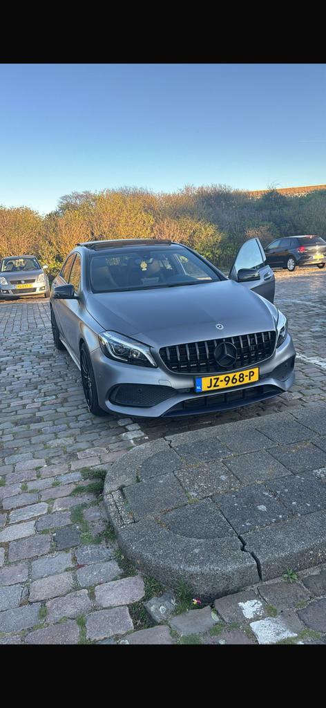 Mercedes A180 AMG | 65k KM | Mat Grijs | PANO | Dealer | NAP, 1295 kg, 4 cilinders, 122 pk, 1200 kg