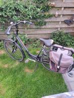 Te koop  één  mooie  damesfiets  met 7 versnellingen, Gebruikt, 47 tot 51 cm, 50 km per accu of meer, Ophalen