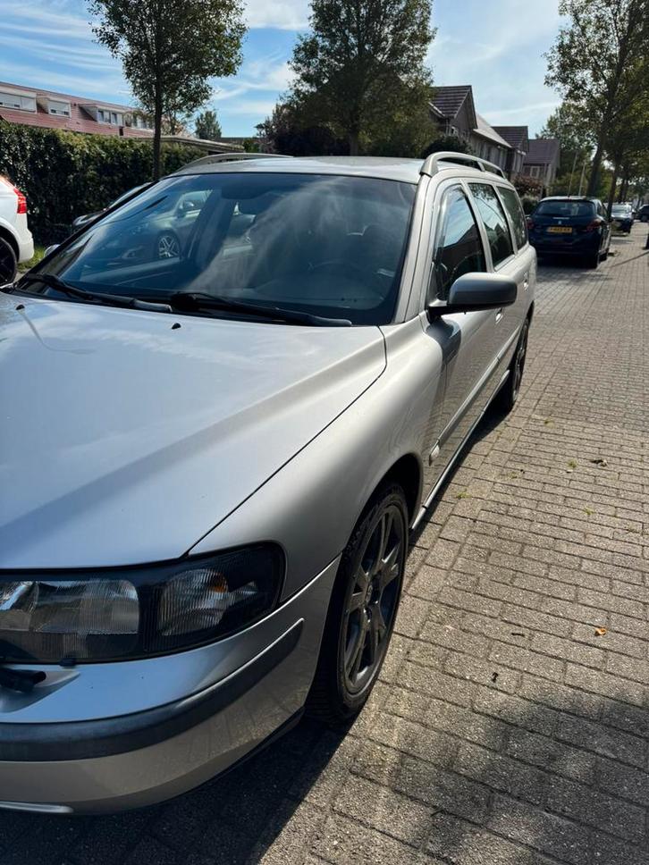 Volvo v70, Auto's, Volvo, Particulier, V70, Benzine, Handgeschakeld, Zilver of Grijs, Leder en Stof, Onderhoudsboekje, Ophalen