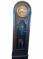 Staand horloge, Ophalen