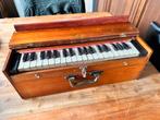 Draagbaar harmonium, kofferharmonium, Ophalen