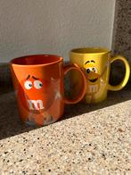 2 mokken M&M, Ophalen of Verzenden, Zo goed als nieuw, Overige stijlen, Kop(pen) en/of Schotel(s)