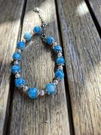 Mooie armband met blauwe kraaltjes !!, Sieraden, Tassen en Uiterlijk, Armbanden, Ophalen of Verzenden, Nieuw, Blauw, Overige materialen