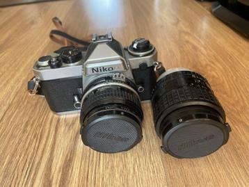 Nikon FE-spiegelreflexcamera met Nikon 50 mm en extra lens beschikbaar voor biedingen