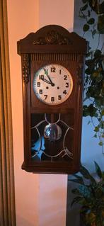 Antieke wandklok, Ophalen