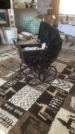 Antieke poppenwagen, Ophalen