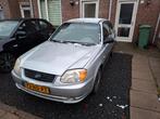 Hyundai Accent 1.3 3DRS 2003 Grijs, Auto's, Hyundai, Voorwielaandrijving, 40 €/maand, 4 cilinders, 965 kg